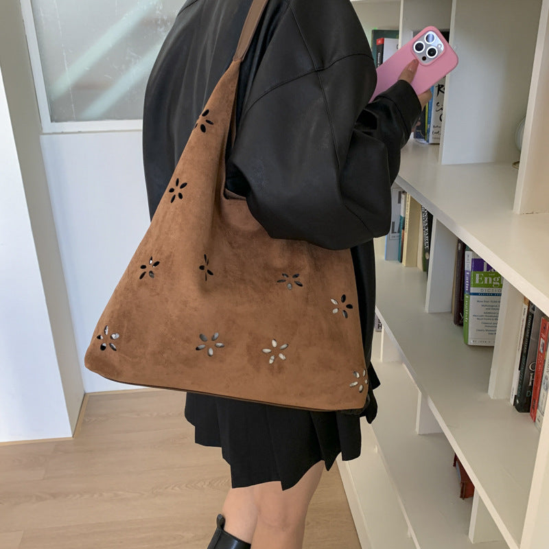 Wholesale Trendy suede flower hollow handbag shoulder underarm bag